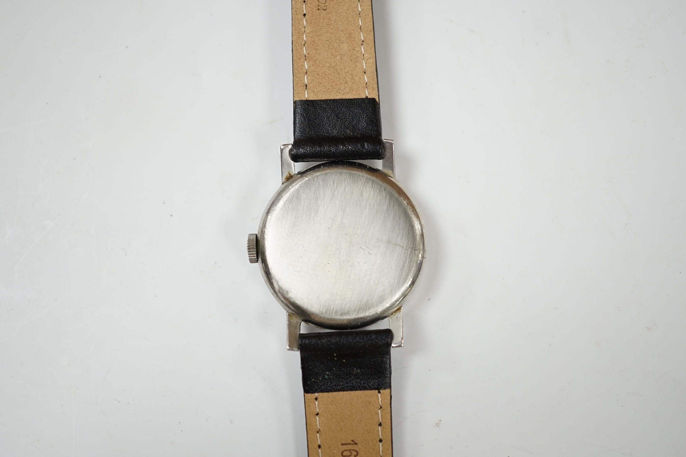 A gentleman's stainless steel Omega manual wind wrist watch, with subsidiary seconds, on later associated leather strap, case diameter 30mm, no box or papers.